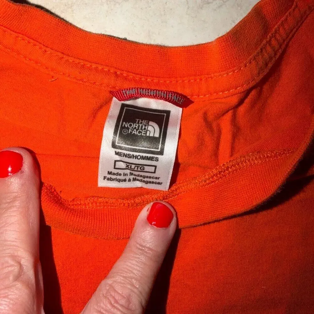The North Face Men’s “Never Stop Exploring” Graphic Tee – Orange XL